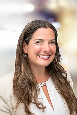 Portrait of Nicole Schreibstein Abbott, REALTOR® | NRLUX